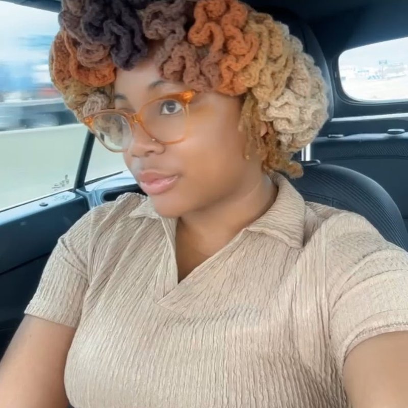 Crocheted ombre hair piece in brown, rust, and cream tones