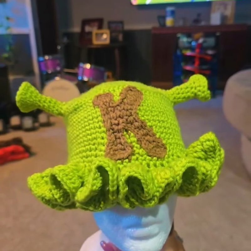 Bright green Shrek-themed crochet hat with custom initial patch